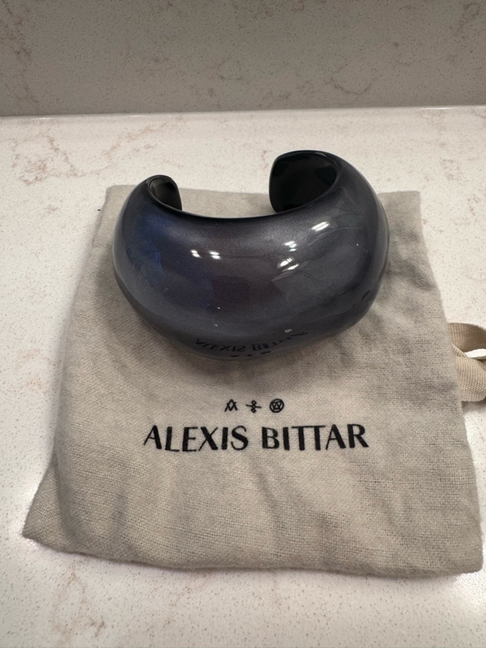 Alexis Bittar Black Gloss Lucite Cuff with Gold Logo Plaque